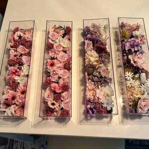 4 plastic rectgl “vases” with faux flowers. 2 Red & pink, 2 purple. 4”x 16” each